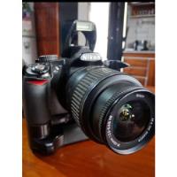 Nikon D3100 + Grip segunda mano  Argentina