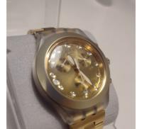 Reloj Swatch Irony Diaphane Dorado segunda mano  Argentina